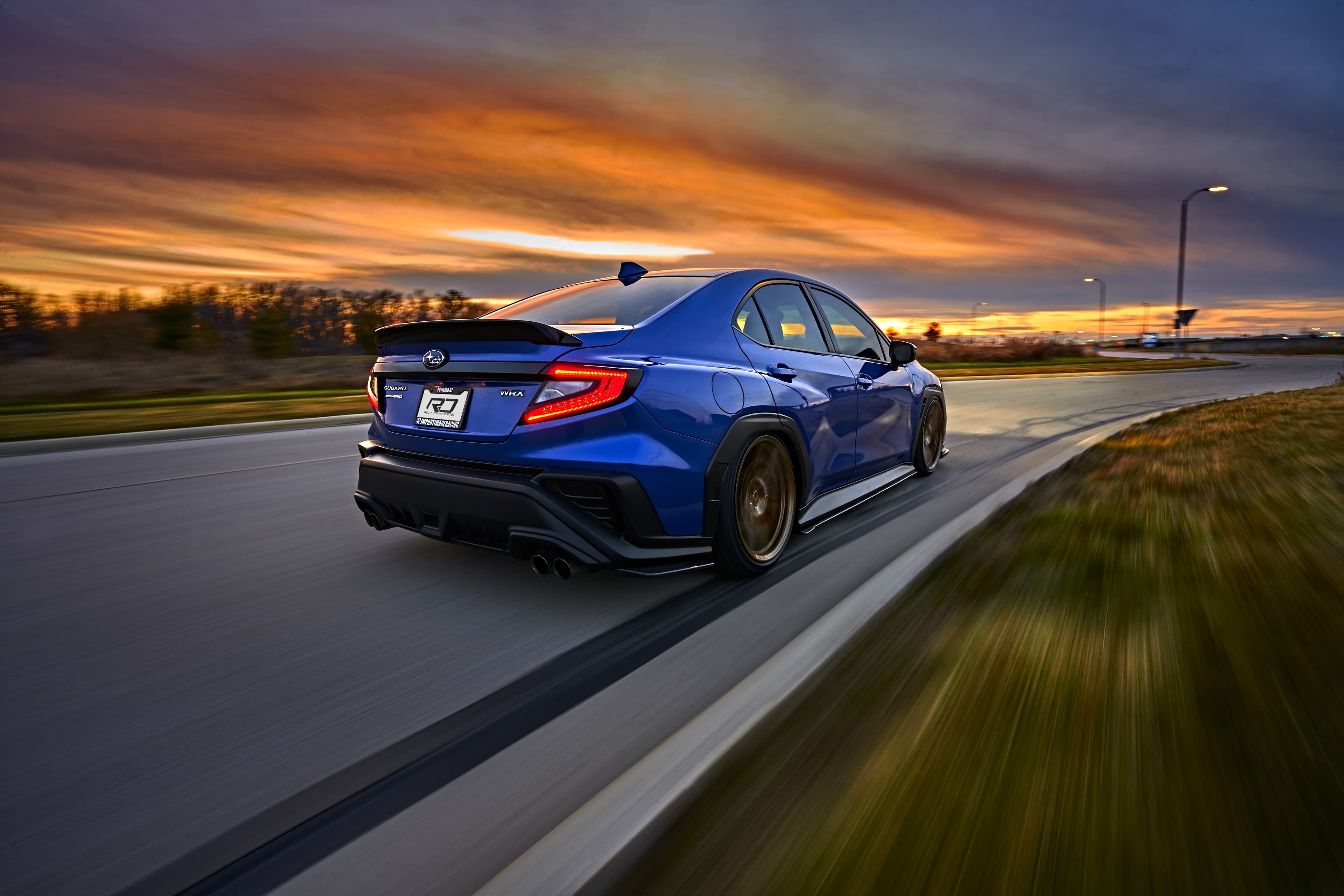 Subaru WRX 2022 driving down a road