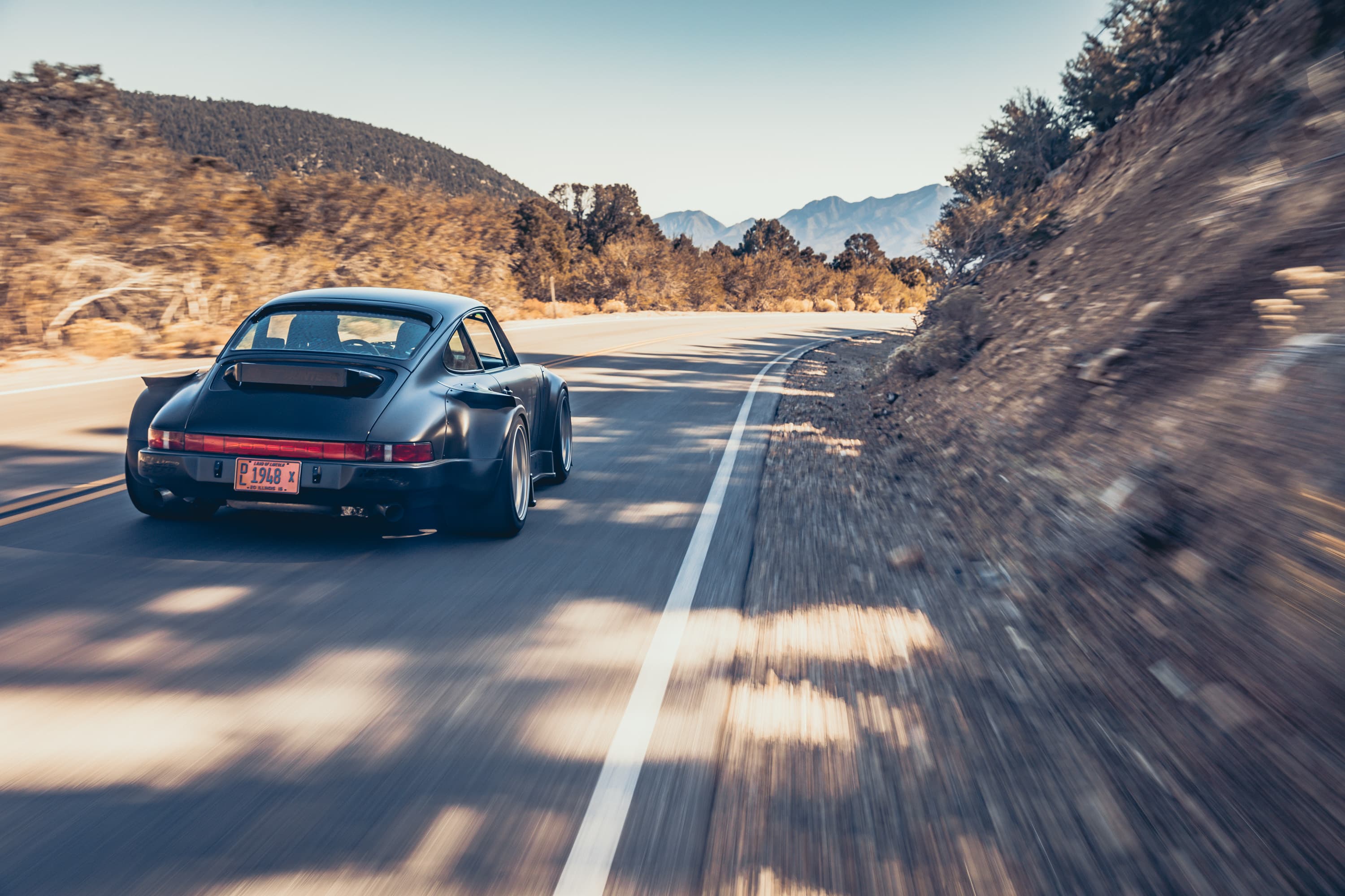 Porsche 964 rolling through Red Rock Canyon after SEMA